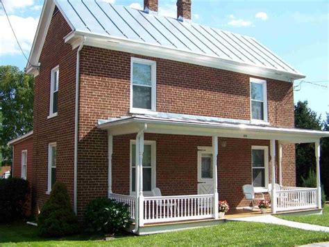 pictures of metal roofs on red brick houses|roof colors for brick house.